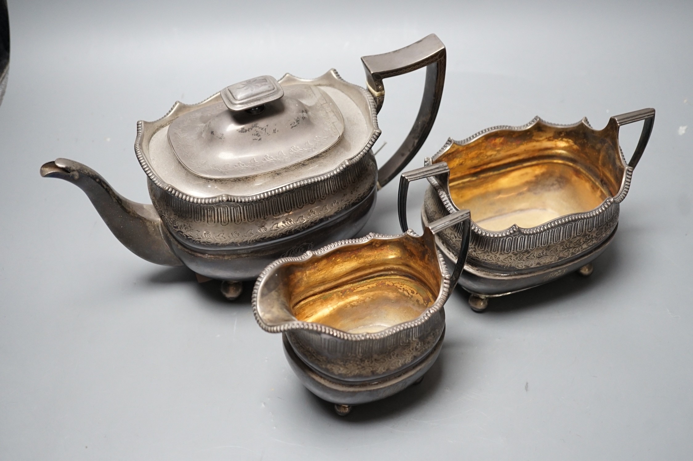 A George III Scottish silver three piece tea set, George McHattie, Edinburgh, 1809, 36.4oz.